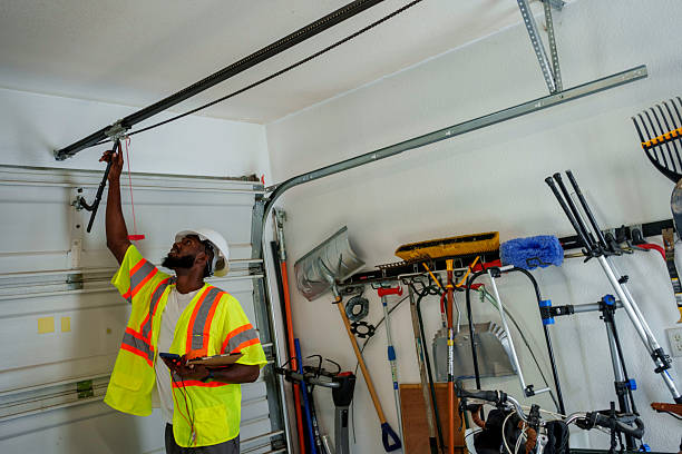 Professional Garage Door Panel Replacement technician working in Portage, WI
